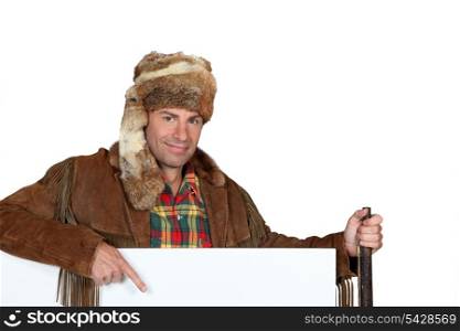 Man wearing a fur hat