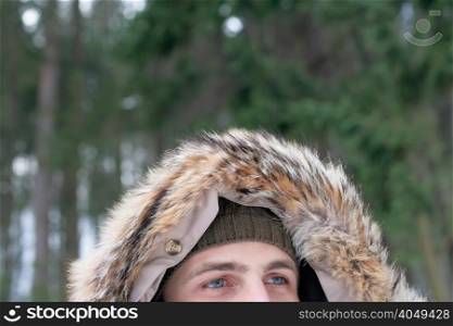 Man wearing a furry hood