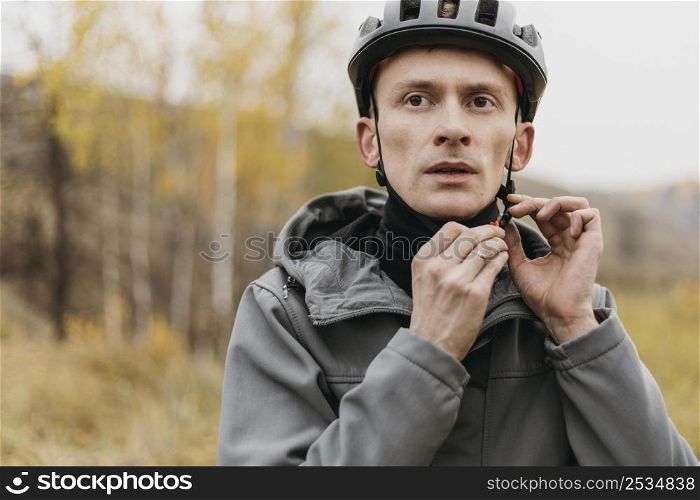 man wearing bike helmet concept