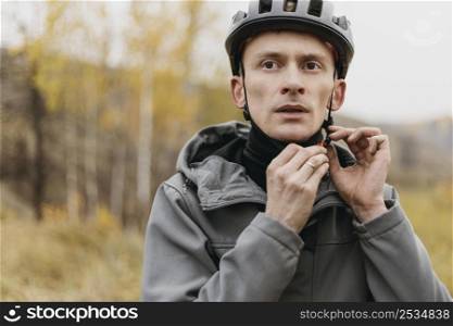 man wearing bike helmet concept