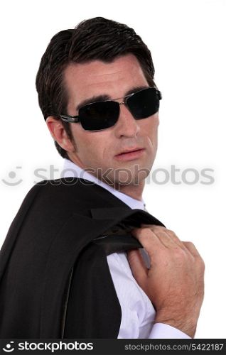 Man wearing dark sunglasses