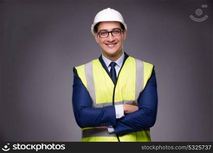 Man wearing hard hat and construction vest