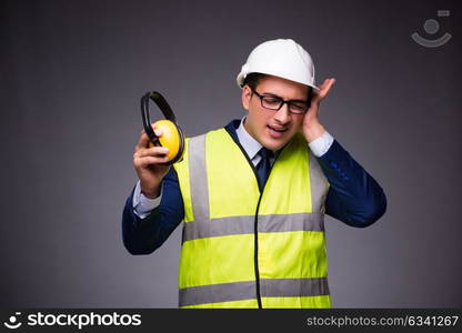 Man wearing hard hat and construction vest