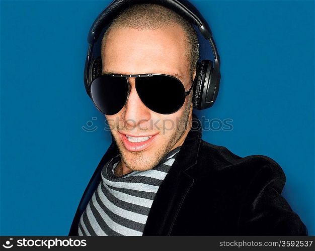 Man wearing headphones in studio head and shoulders