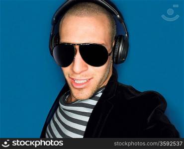 Man wearing headphones in studio head and shoulders