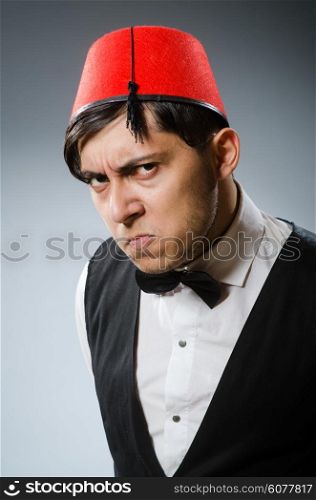 Man wearing traditional turkish hat fez