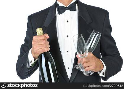 Man Wearing Tuxedo Holding Champagne Bottle and Glasses