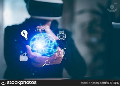 Man wearing VR glasses virtual with  brain icon and line control in graph Screen Icon of a media screen, Technology Process System,Concept Futuristic medicine, the human body, and the future,brain.