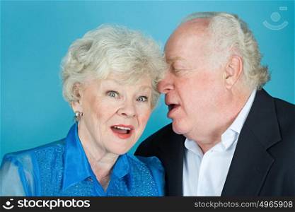 Man whispering to wife