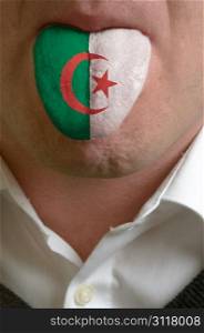 man wit open mouth spreading tongue colored in algeria flag as symbol of values like teaching, learning, multilingual speaking different of languages