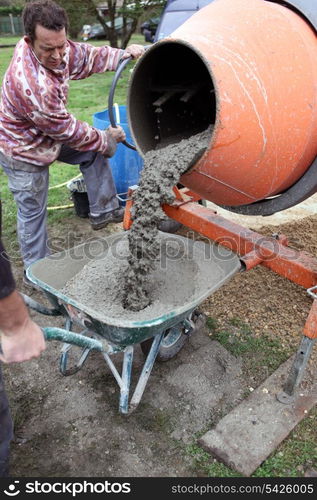 Man with a cement mixer