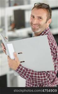 man with a folder