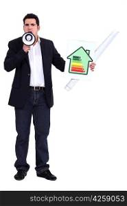 Man with a megaphone and energy rating card