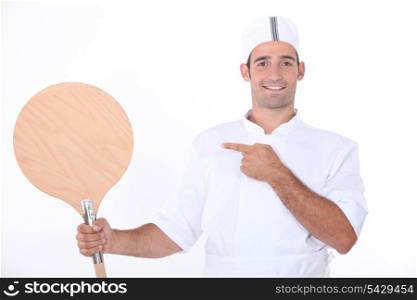 Man with a pizza peel
