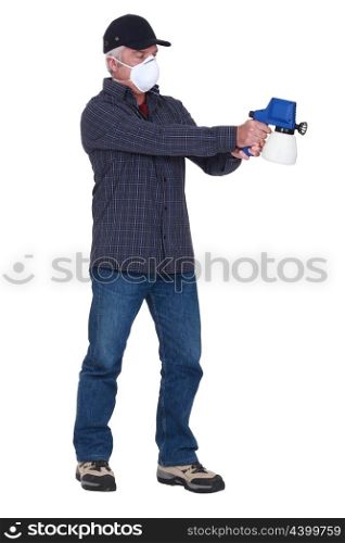 Man with a pressure sprayer