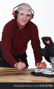 Man with a rotary saw