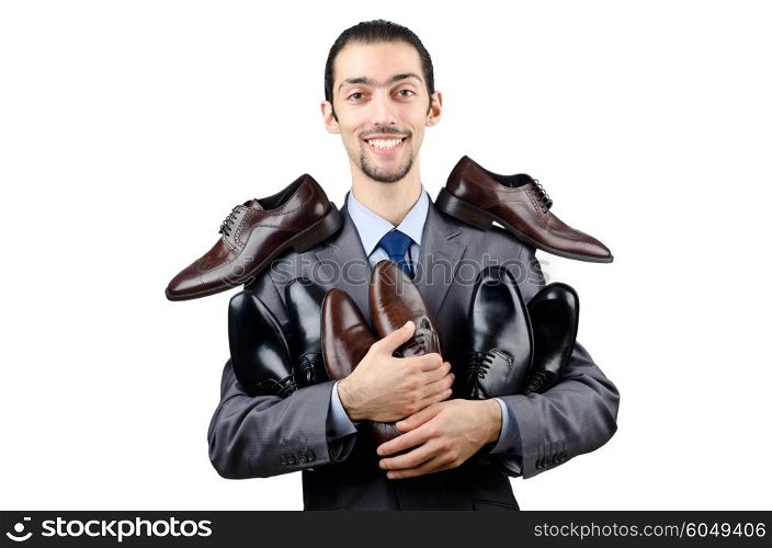 Man with a selection of shoes