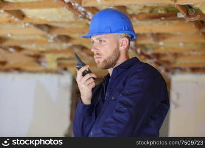 man with a walkie talkie