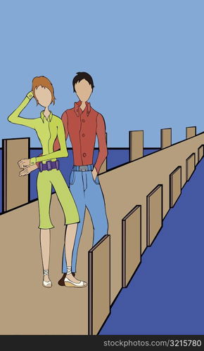 Man with a woman standing on a pier