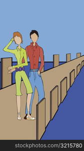 Man with a woman standing on a pier