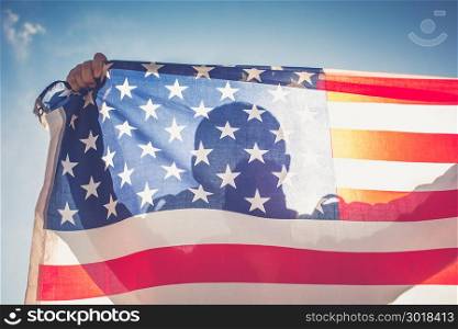 Man with American flag caught with hands