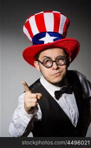 Man with american hat wearing glasses