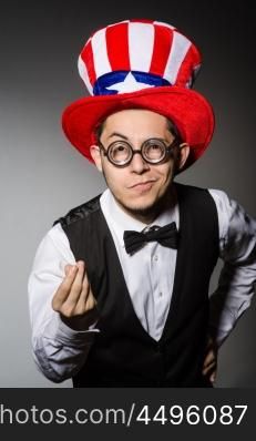 Man with american hat wearing glasses