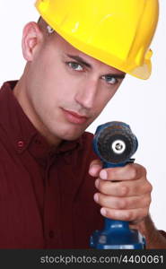 Man with an electric screwdriver