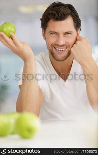 man with apple logo fruit