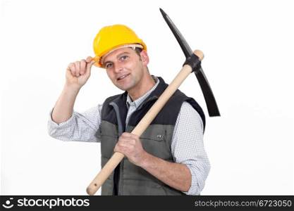 Man with ax tipping helmet