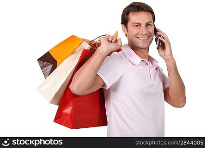 Man with bag on the phone