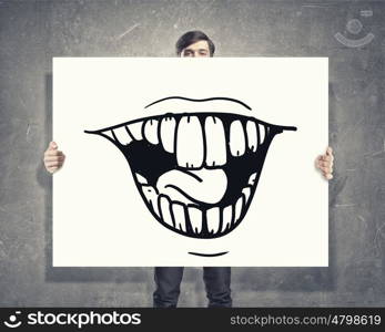 Man with banner. Businessman holding and hiding behind card with smiley face emoticon