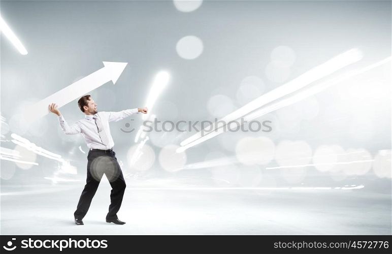 Man with banner. Businessman in suit throwing white blank arrow in hands