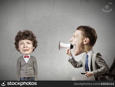 Man with big head. Funny young man with big head screaming emotionally in megaphone