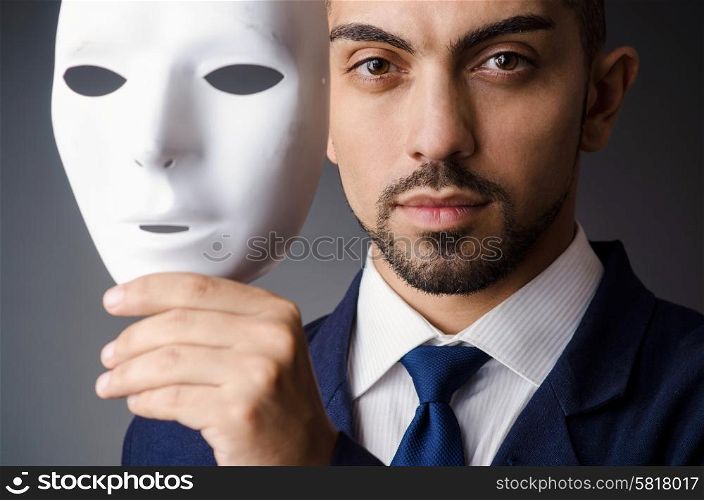 Man with black mask in studio