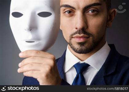 Man with black mask in studio
