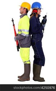 Man with bolt cutters and woman with a drill