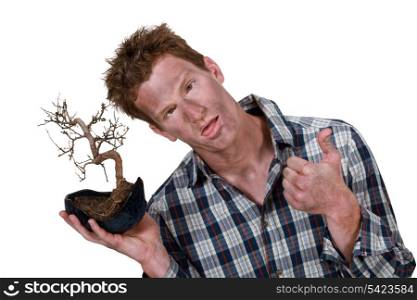 Man with bonsai