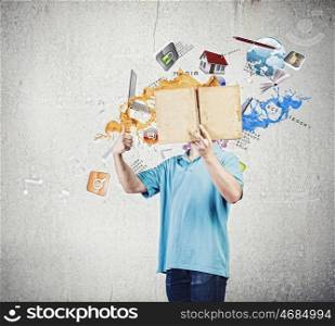 Man with book. Young man in casual holding opened book with icons flying out