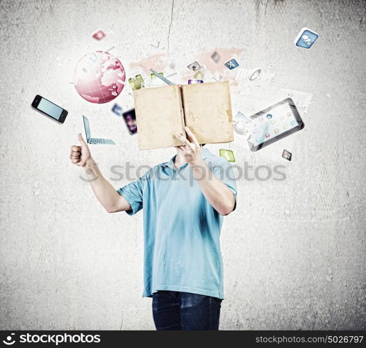 Man with book. Young man in casual holding opened book with icons flying out