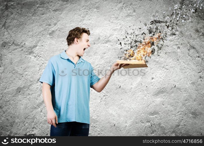 Man with book. Young man with opened book and characters flying out