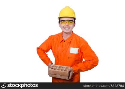 Man with brick isolated on white