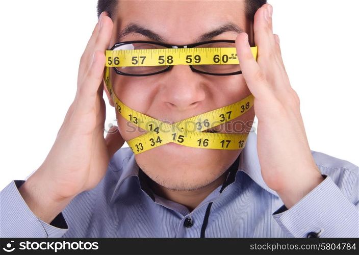 Man with centimeter in dieting concept