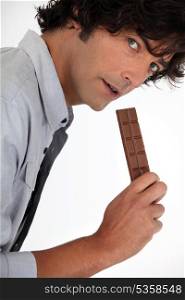 Man with chocolate bar