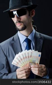 Man with counterfeir money
