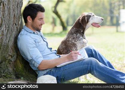 man with dog in the park