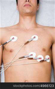 Man with electrodes on chest