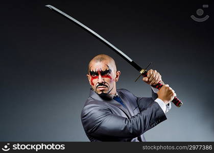 Man with face paint and sword