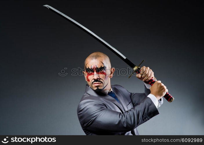 Man with face paint and sword