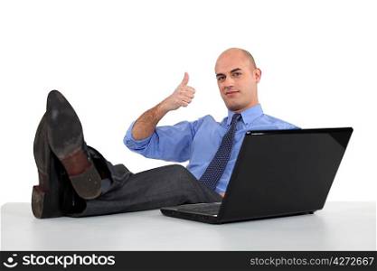 Man with feet on the table